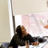 adult and organizational development student and professor interacting
