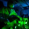 Chemistry student handles equipment in Temple's Borguet Lab.