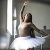 A portrait of Chanel Holland dancing in her ballet studio